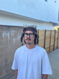 Horned flap cap
